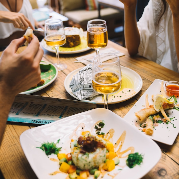 Close up view of friends eating