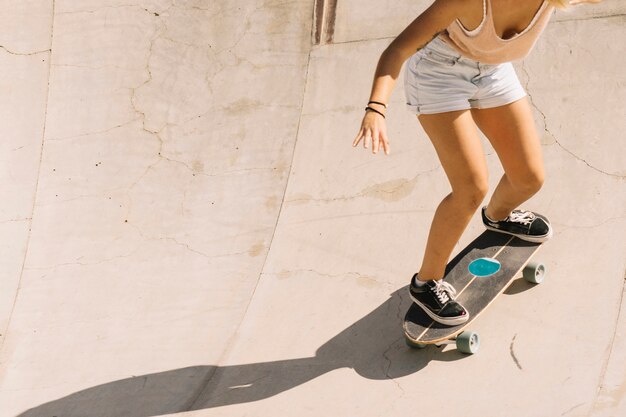 Close up view girl skating