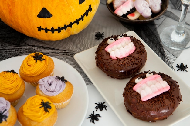 Free photo close-up view of halloween donuts concept