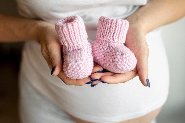 Close-up view pink baby shoes