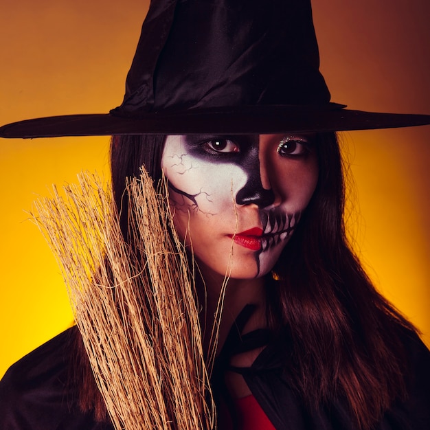 Free Photo close up view of witch with broom