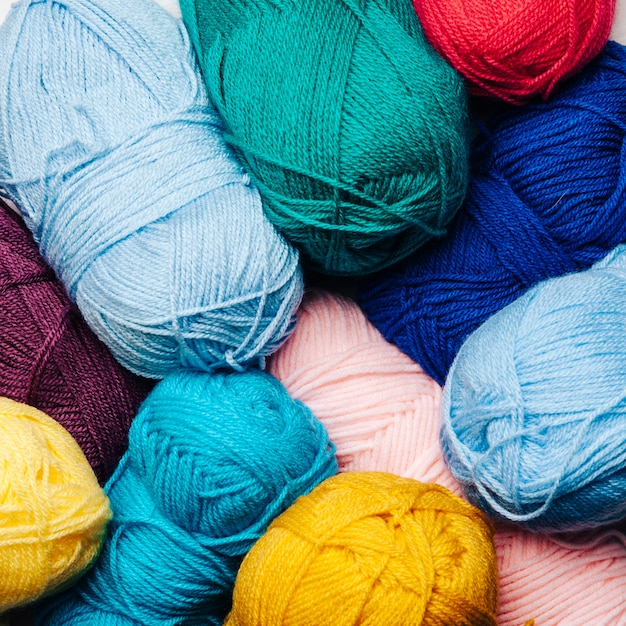 Close up view of wool balls in different colors