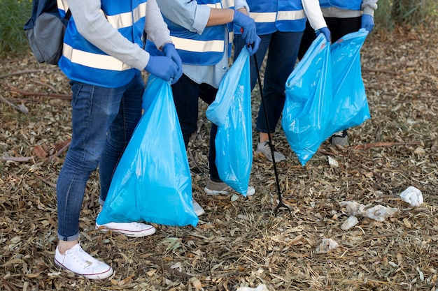 Free photo close up volunteers working together