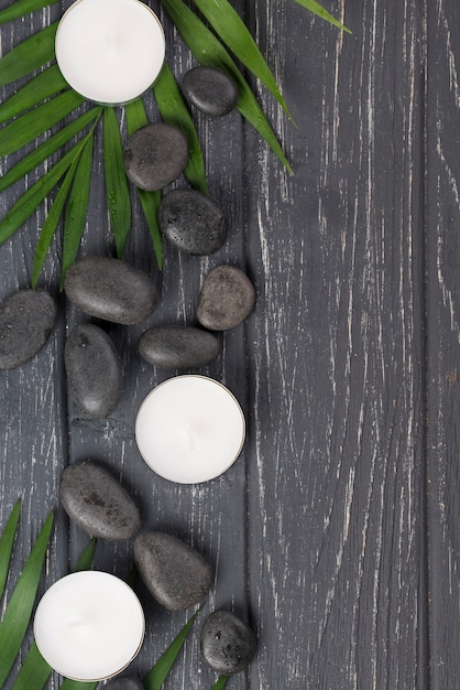 Free photo close-up wellness stones with candles