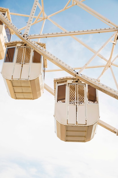 Free photo close-up of white ferris wheel against clear sky