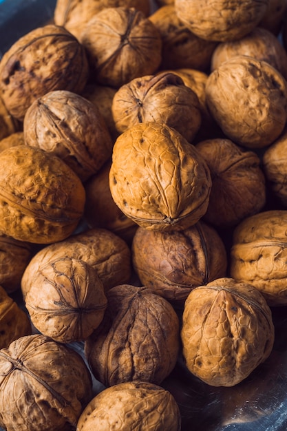 Close-up of whole walnut shells