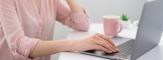 Close-up woman at desk working