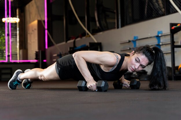 Close up on woman doing crossfit workout