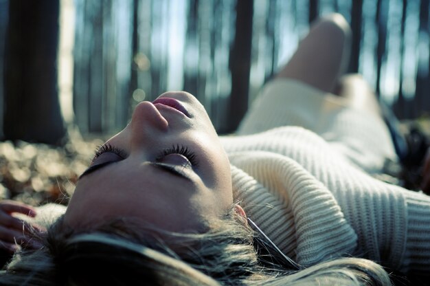 Close-up of woman enjoying an autumn day