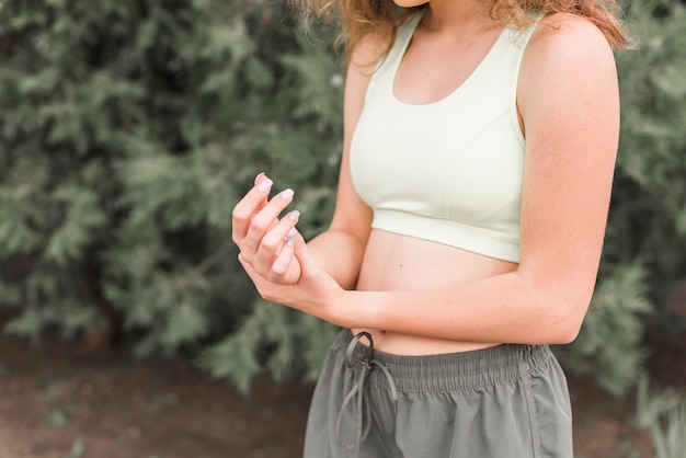 Close-up of woman having pain in her wrist