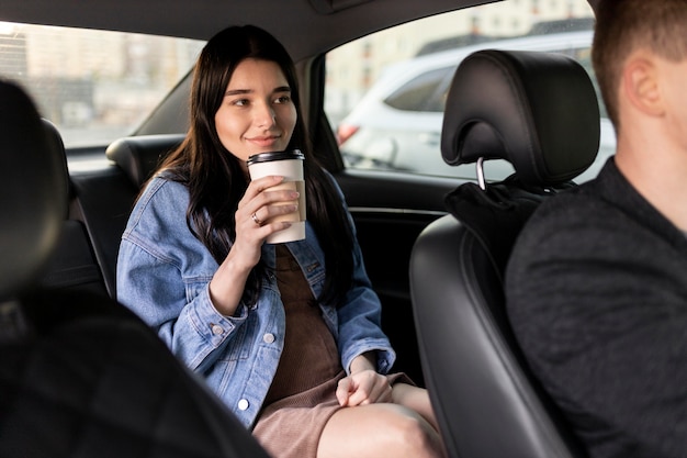 Close up woman holding coffee cup