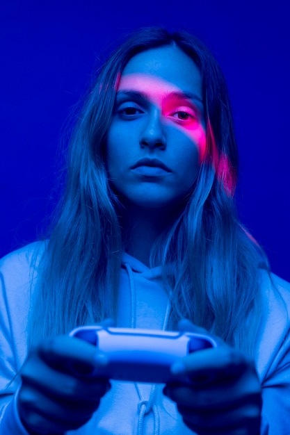 Free photo close up woman holding  controller