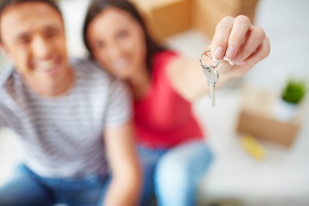 Close-up of woman holding a key