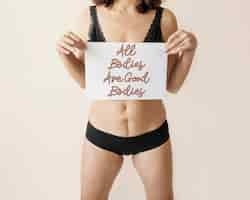 Free photo close up woman holding positive message