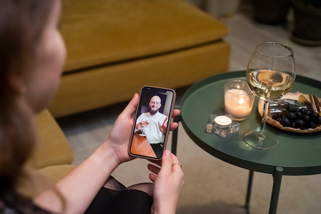 Close up woman holding smartphone