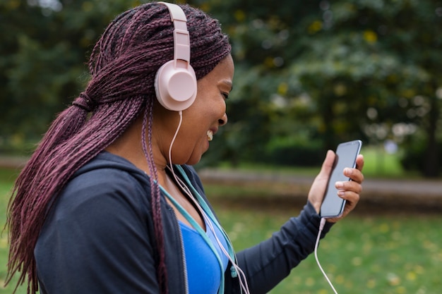 Close up woman listening to music