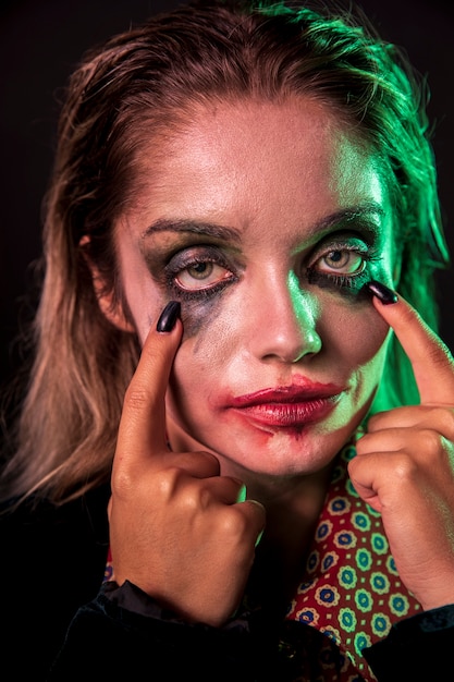 Free Photo close-up woman make-up as a clown portrait