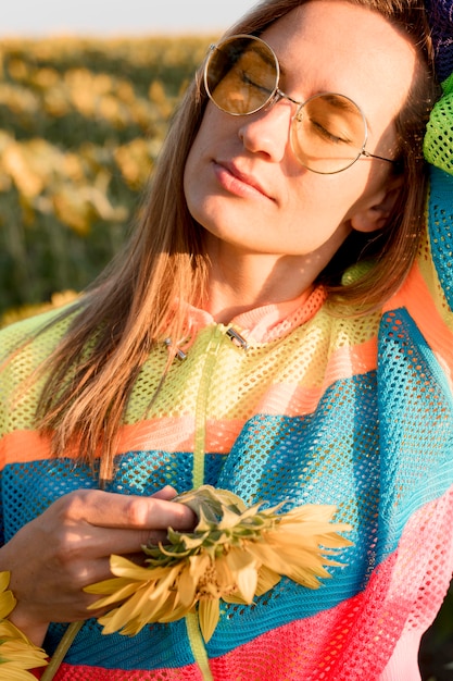 Free photo close-up woman posing in nature