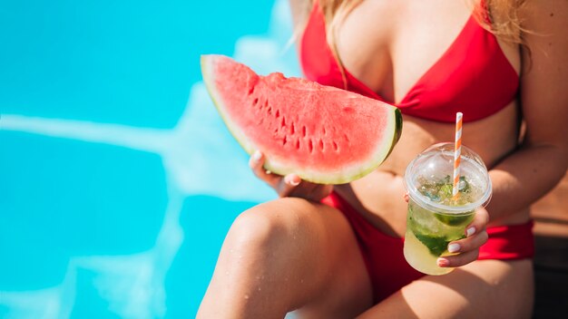 Close-up woman posing in swimwear with copy space