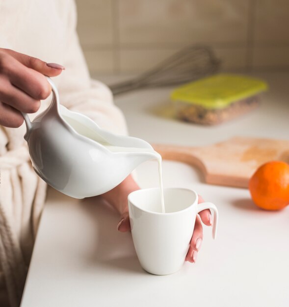 Close up of woman preparing breakfast