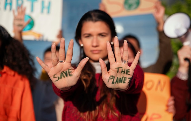 Free photo close up woman at protest