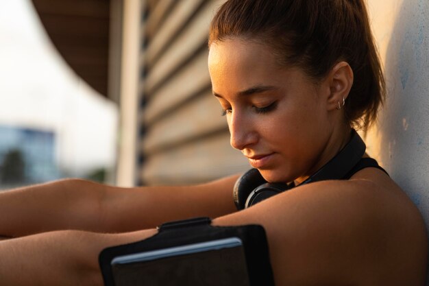 Close-up woman sitting outdoors