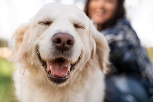 Close up woman and smiley dog