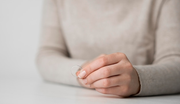 Close-up woman thinking off divorce