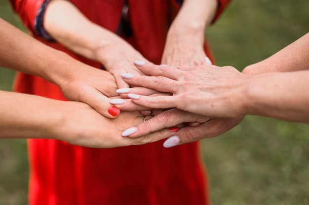 Free Photo close-up woman touching hands together