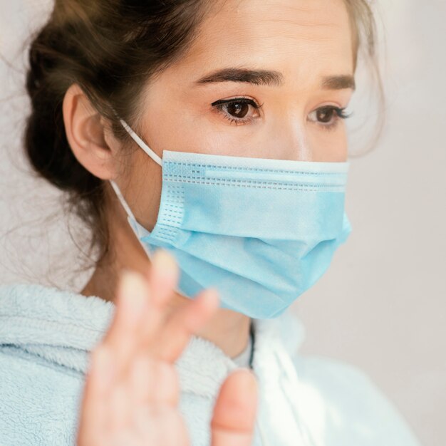 Close-up woman wearing face mask