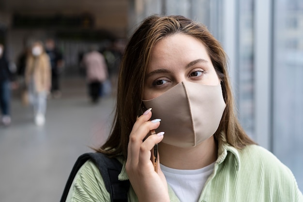 Close up woman wearing face mask