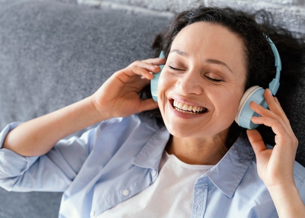 Close up woman wearing headphones