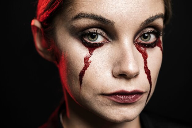 Close-up of woman wearing make-up