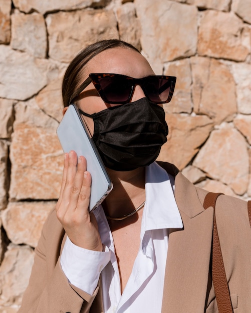 Free Photo close-up woman wearing mask