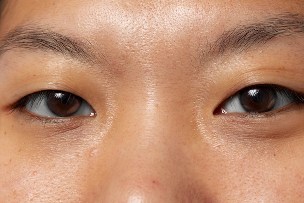 Close up woman with brown eyes