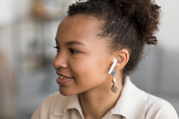 Close up woman with earphones