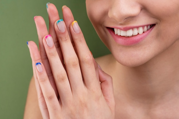 Close up woman with french manicure