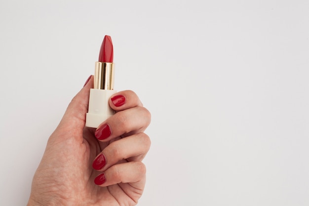 Close-up woman with red lipstick and white background