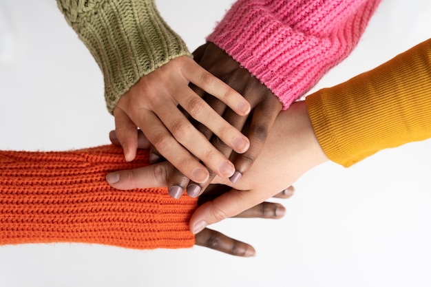 Free Photo close up on women hands holding each other