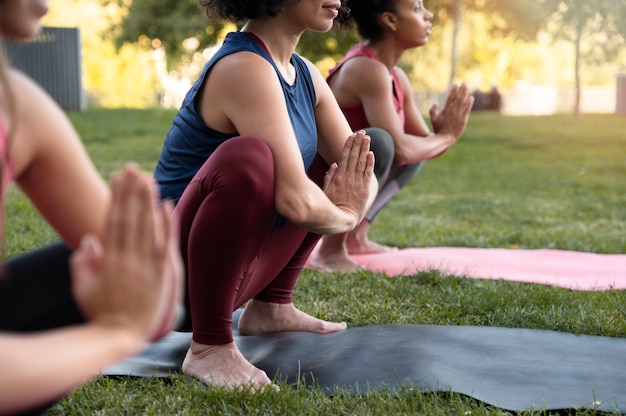 Close up women working out together