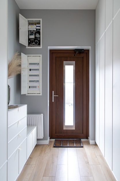 Close-up of a wooden door in the hallway in the style of minimalism.