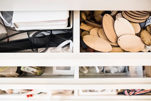 Free Photo close-up of wooden tags in shelf