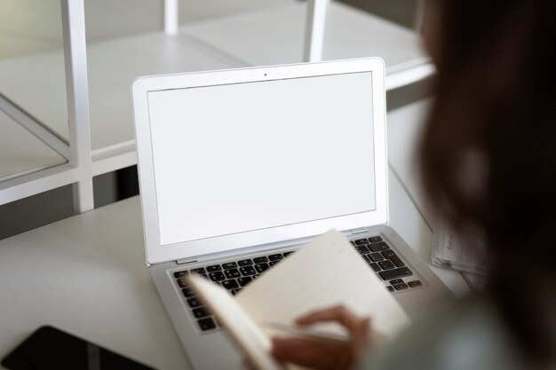 Close up worker and laptop