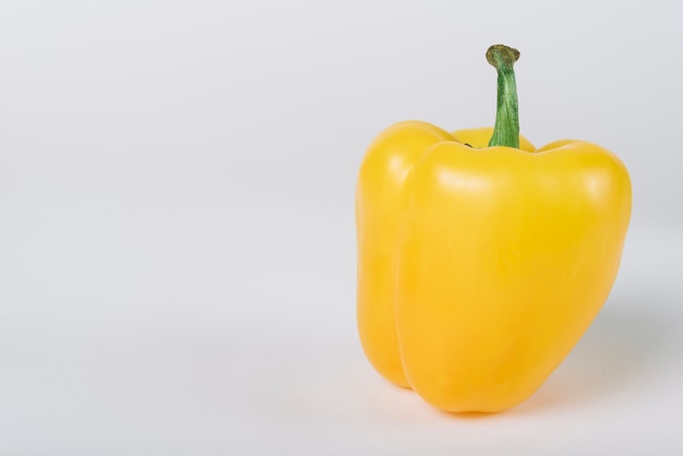 Free photo close-up of yellow bell pepper on white background