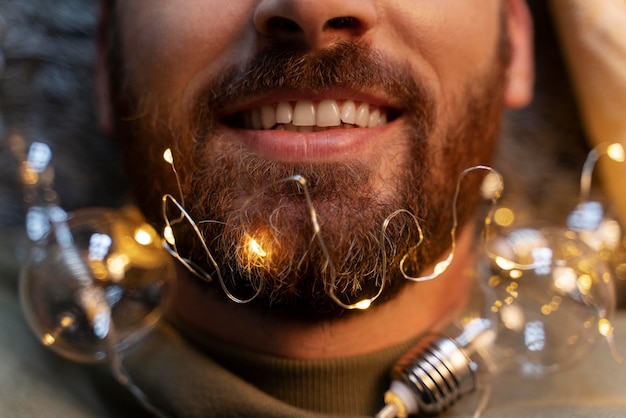 Close up on young adult enjoying christmas lights