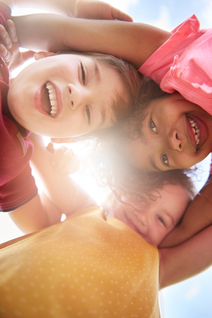 Close up on young beautiful children having fun together