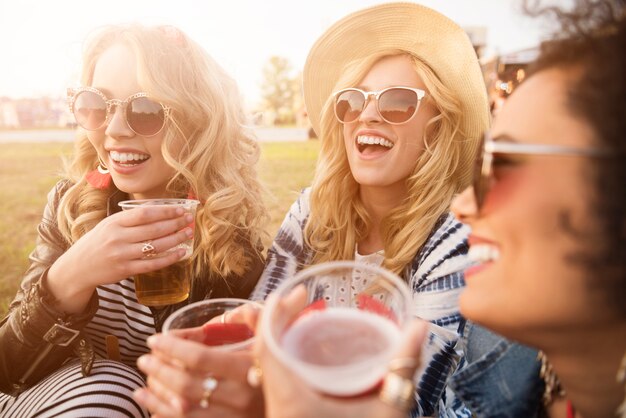 Close up on young beautiful women having fun