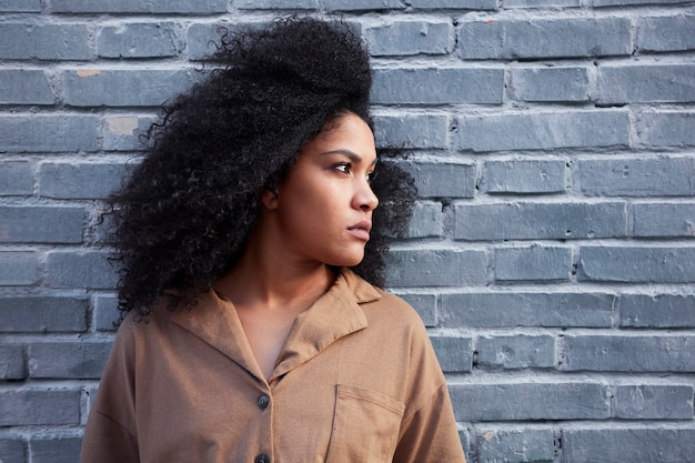 close up of young black woman with afro hair