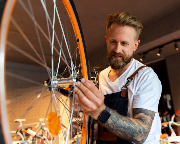 Close up on young businessman in bike shop