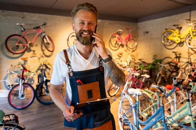 Close up on young businessman in bike shop